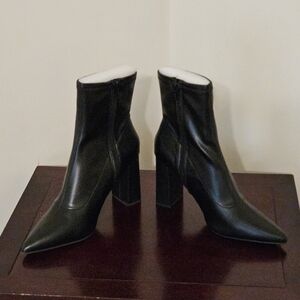 Wild Pair Black Heeled Boots